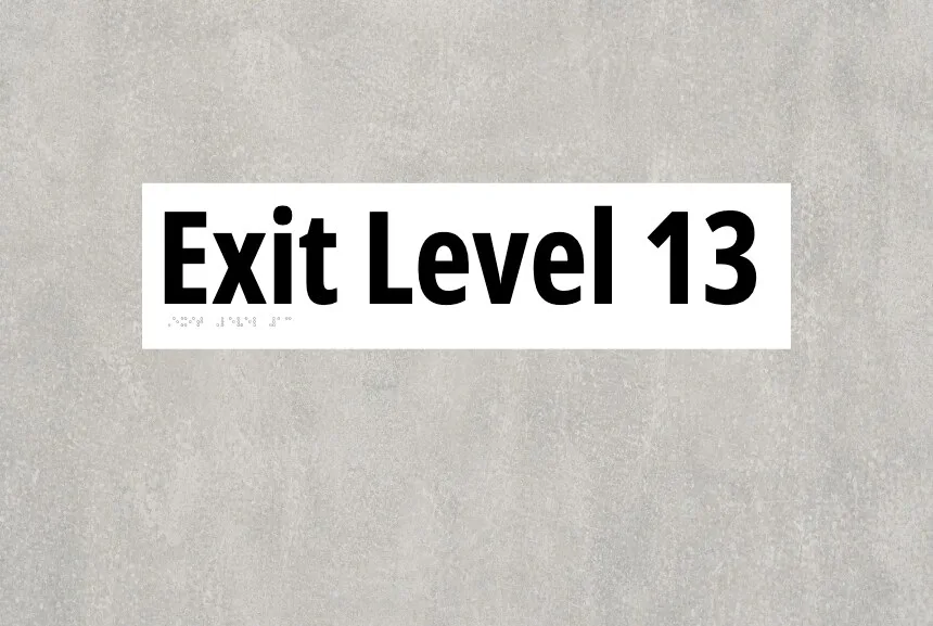 Live Braille sign customiser showing EXIT LEVEL 13 with its translated tactile dot row