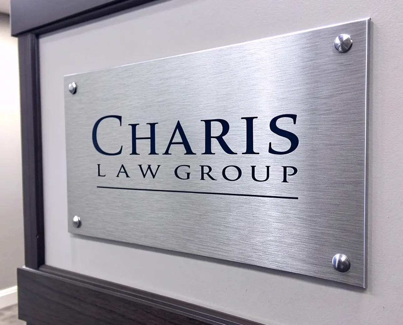 Charis Law Group brushed stainless plate sign