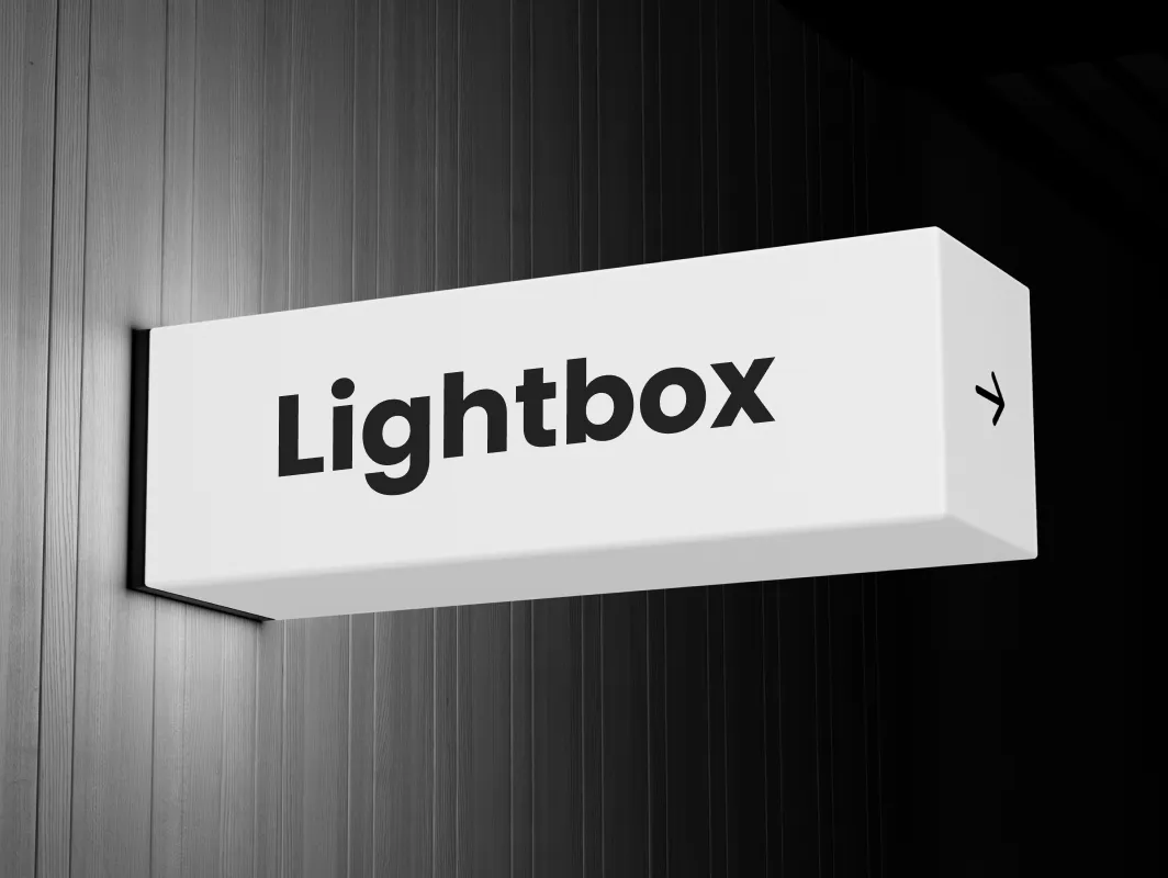 A wall-mounted lightbox sign that reads Lightbox