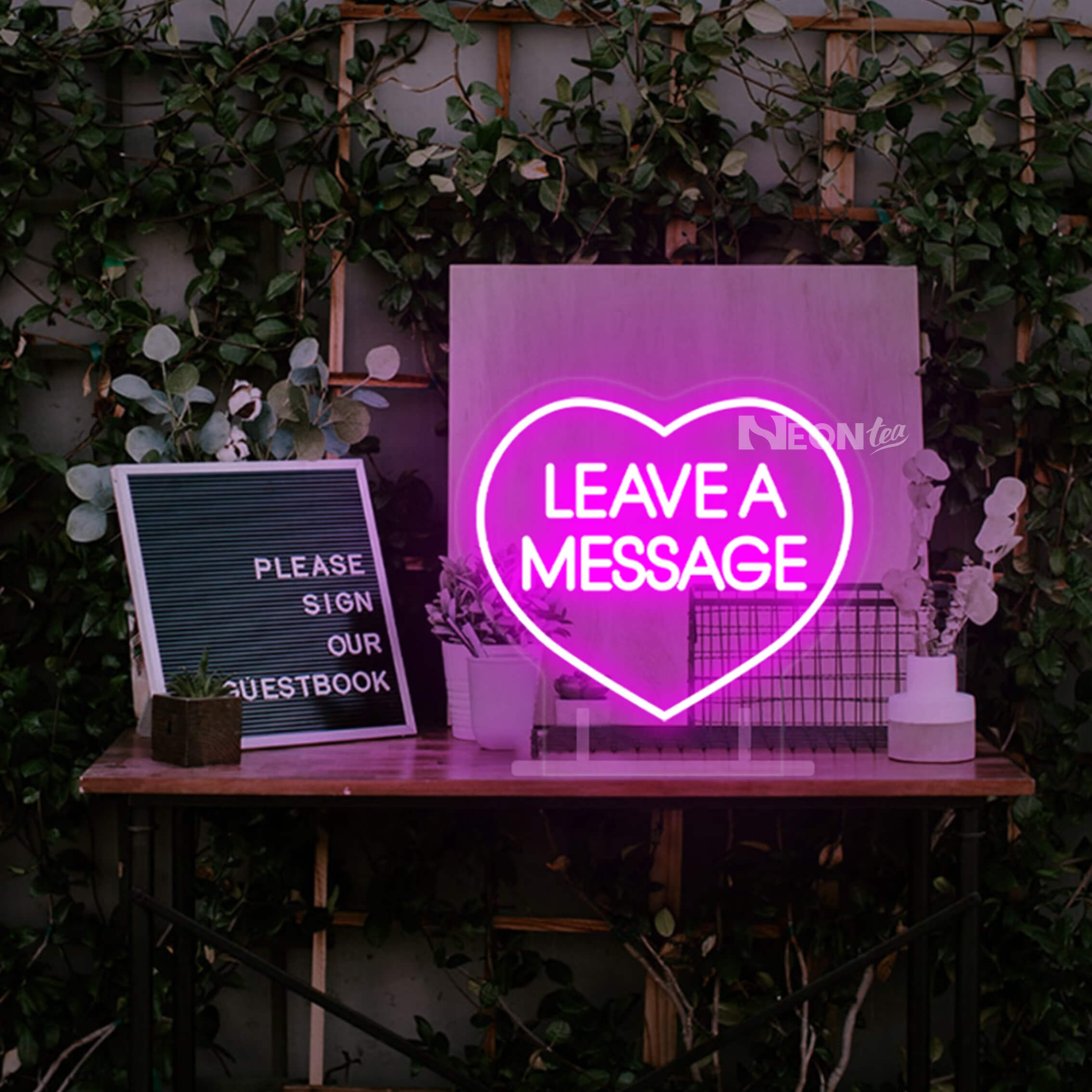Use neon wedding signs for guestbook table Use neon wedding signs for guestbook table